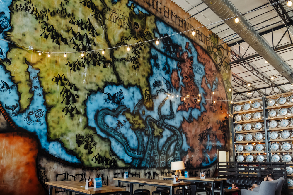 Seating and mural at the Dogtap