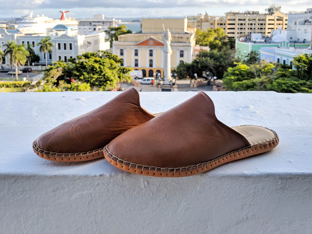 Beek leather slides on a hotel balcony
